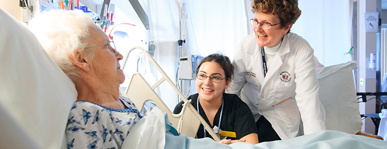 Health care workers with patient